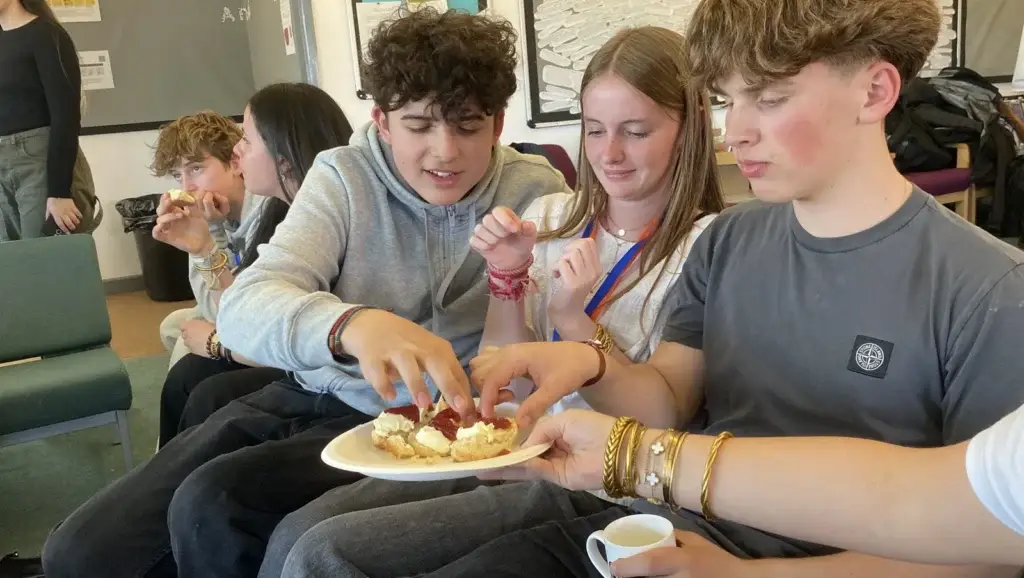 Students sharing food during a GSE school exchange